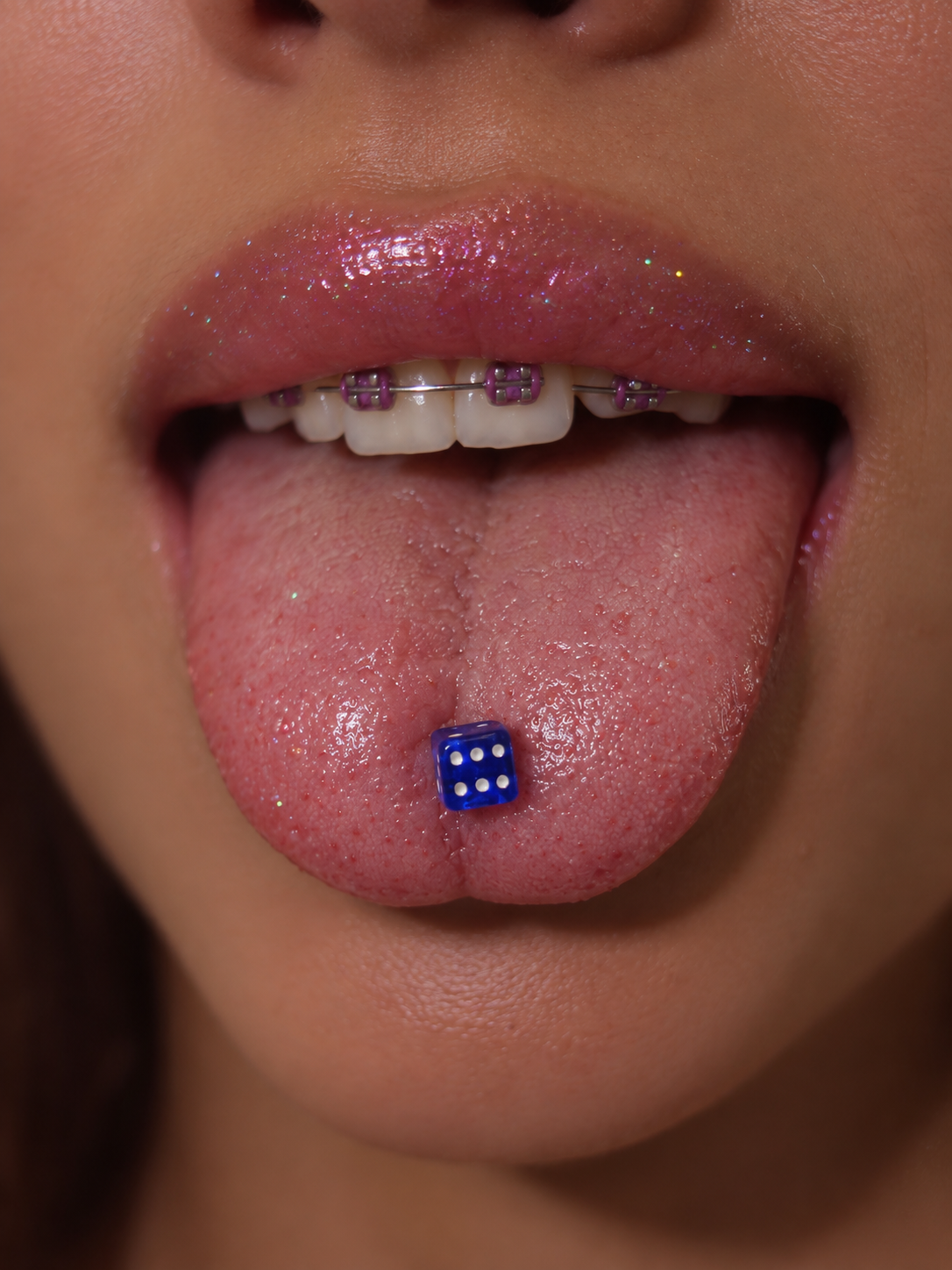 Dice tongue rings