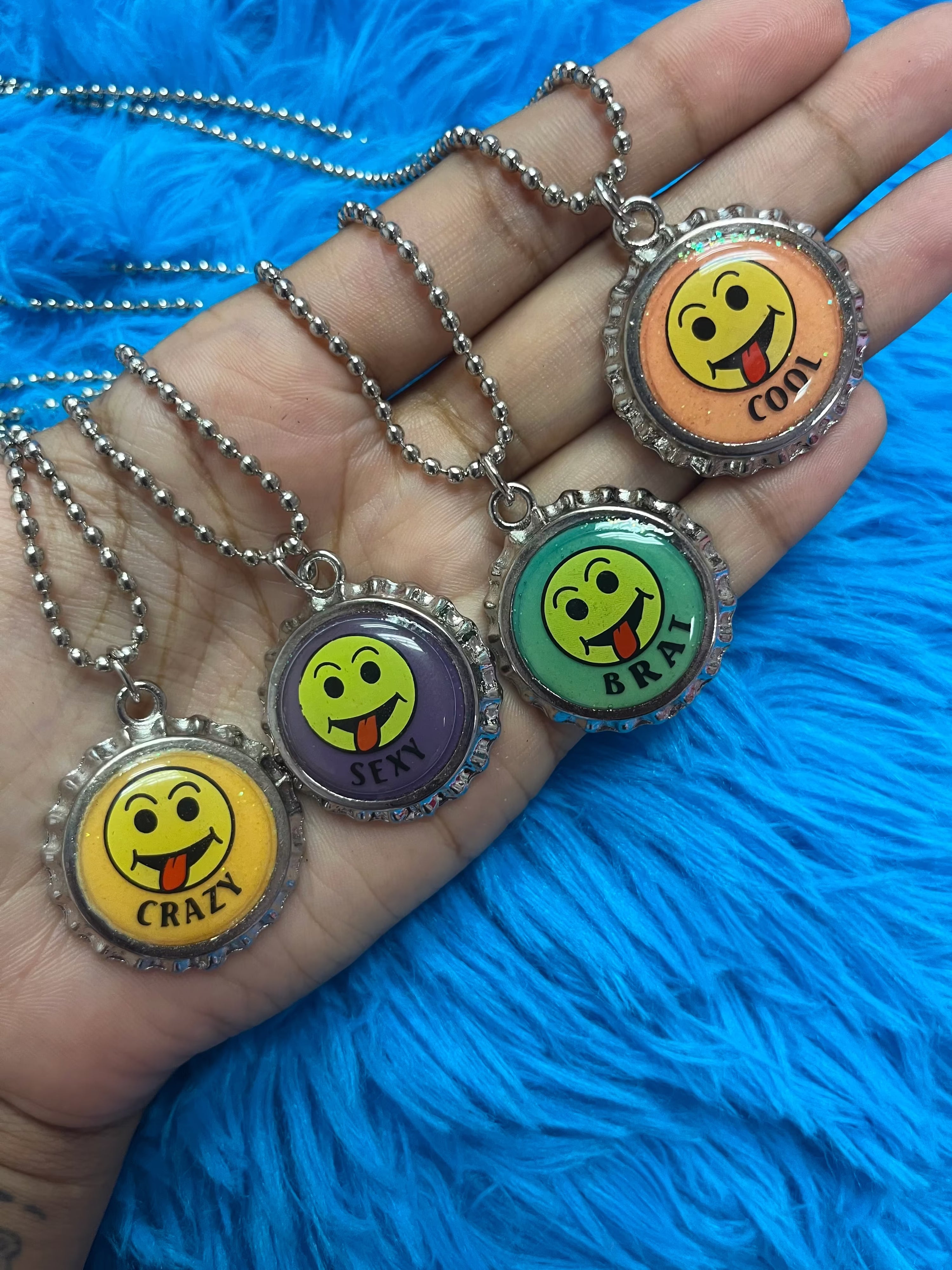 Glow in the dark bottle cap necklaces