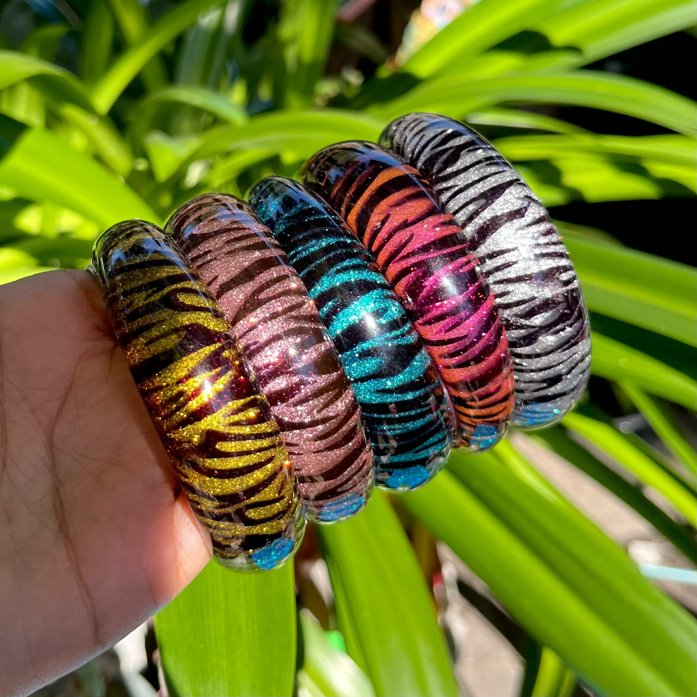 Dark pink glitter zebra print bangle bracelet