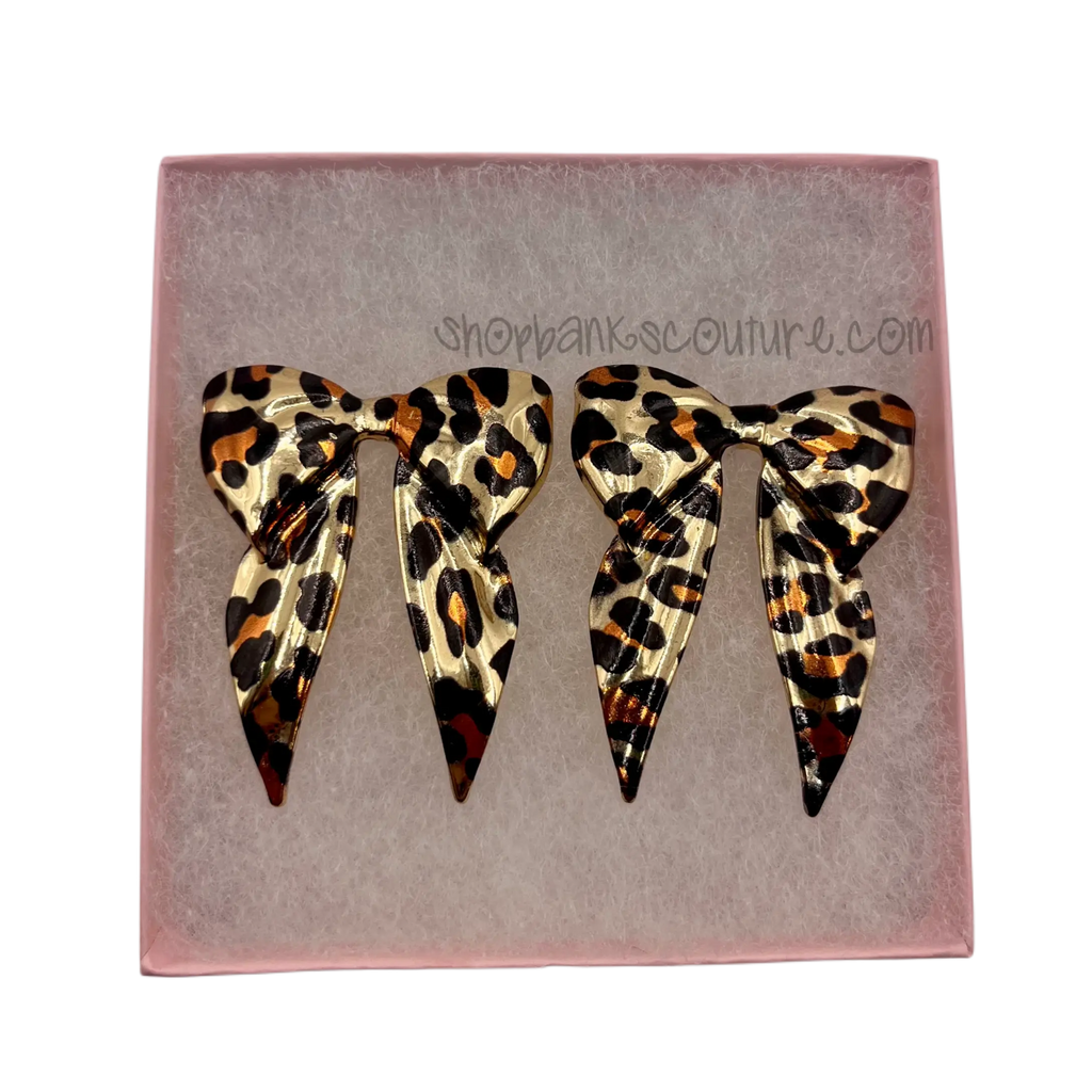 On the prowl bow stud earrings