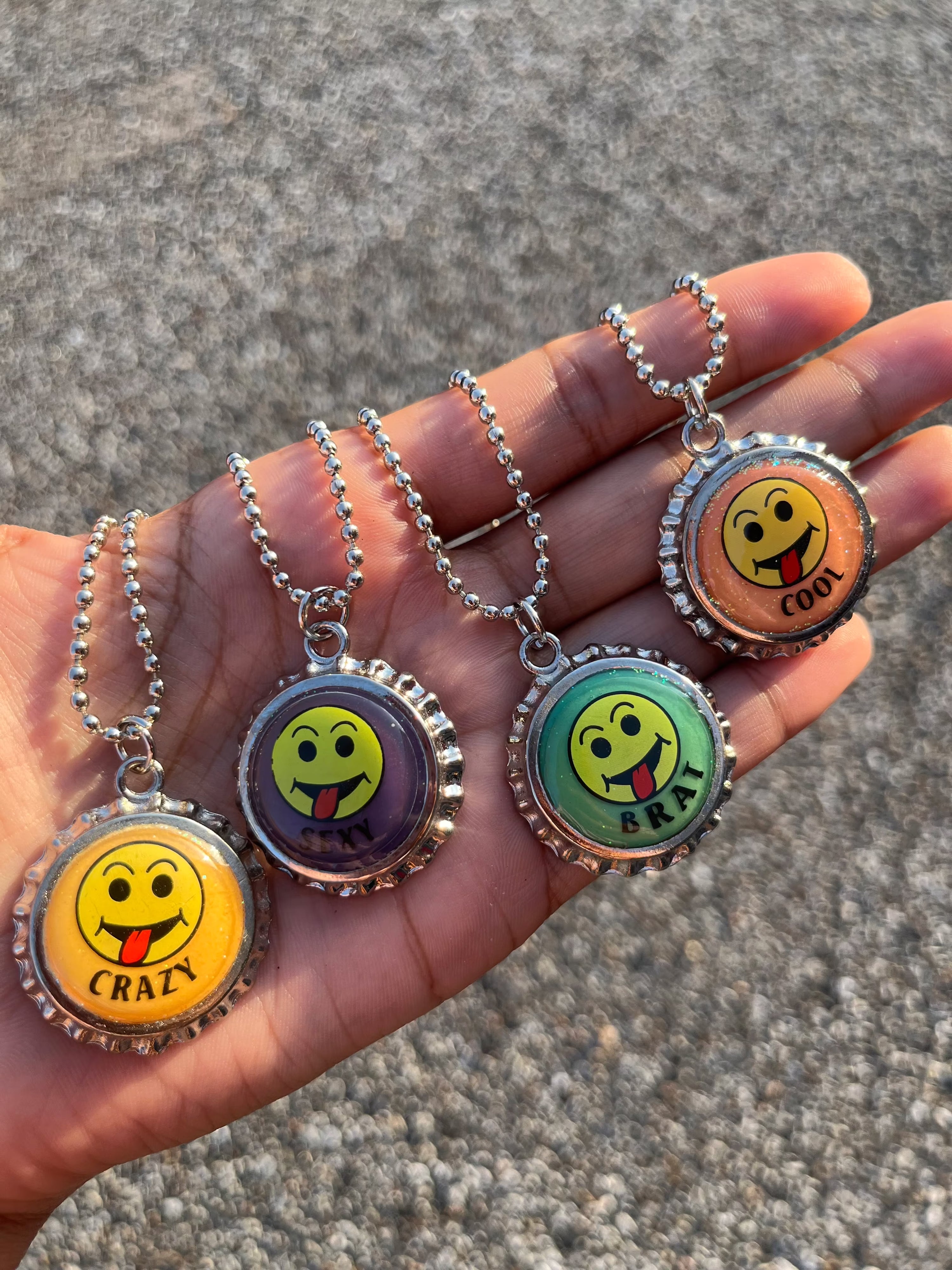 Glow in the dark bottle cap necklaces